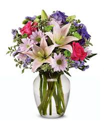 Beautiful pink pastel flowers on beige background, top, border. Pastel Beauty Bouquet At From You Flowers