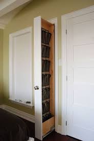 The shoe cabinet features four shelves discreetly placed behind two hinged doors with a magnetic closure, which can serve as a shoe rack or other entryway storage. Narrow Shoe Rack Ideas On Foter