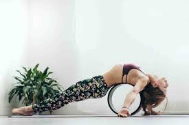 7 Ways To Use A Yoga Wheel