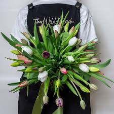 If flowers with free shipping don't get you the deal that you want, try this $12.00 off discount code. Just Tulips Flower Bouquet The Wild Bunch