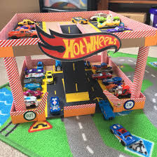 Homemade Parking Garage I Made For My Sons Hot Wheels Cars Hot Wheels Diy Hot Wheels Garage Wooden Toy Garage