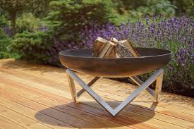 The bonfire stainless steel wood burning fire pit is the world's most unique fire pit because it pushes the limits of both combustion airflow efficiency and minimalist outdoor design. Buy Hand Crafted Modern Outdoor Patio Rust Stainless Steel Fire Pit Memel Large Made To Order From Curonian Deco Custommade Com