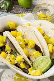 Paired with cilantro lime then a squeeze of lime juice and you are in mexico. Fish Tacos With Mango Coconut Lime Salsa Seafood Recipes Lime Salsa Fish Recipes