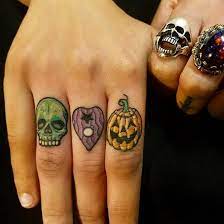 13 Tiny Halloween Tattoos That Are Way More Edgy Than Scary Halloween Tattoos Hand Tattoos Tiny Halloween Tattoos