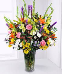 Learn how to make simple flower arrangements that will transform your home decor in an instant. Designers Choice Garden Style Flower Arrangements Peoples Flowers