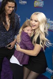 Hugging someone goodbye is such a cute thing. Dove Cameron And Sofia Carson Greet Their Fans At The Disney Channel Fan Fest In Anaheim California 270419 10