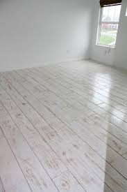 Diy Planked Floors Plywood Used Whitewashed With Primer Then Sanded Slightly Genius Diy Flooring White Wood Floors Painted Wood Floors
