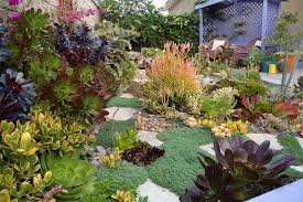 Spring Succulent Garden By Designer Laura Eubanks Add Some Whimsy To Your Garden Today Pa Beautiful Flowers Garden Rock Garden Plants Succulent Landscaping