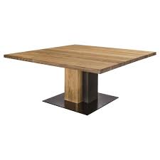 It is crafted of beech wood for classic construction, founded atop four gently tapered legs and featuring a 29.5 l by 29.5 w square. Oak And Iron Square Dining Table In Solid Oak Wood For Sale At 1stdibs