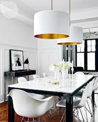 The white quartz countertop is a modern feature that feels retro thanks to its speckled pattern. Top 15 Mid Century Modern Dining Tables
