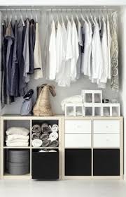 In A Reach In Closet Kallax Converts Floor Space Often Cluttered Into Organized Storage For Folded Clothing O Ikea Hack Bedroom Ikea Closet Hack Kallax Ikea