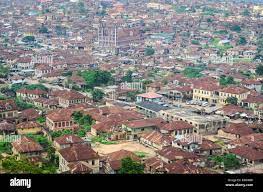 Aerial view of the city of Abeokuta, Ogun state (south-west), Nigeria, and  its houses with rusty rooftops, taken from Olumo rock Stock Photo - Alamy