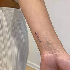 Whether it's a small grandma scrawled in soft script on your shoulder blade or a full back piece with a first name, middle name, last name, date of birth, date of death, and an accompanying quote and meaningful image, this type of memorial tattoo will always be popular. Small Wrist Tattoo Ideas For Both Boys And Girls Body Tattoo Art
