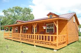 Wildcat Barns Offers Great Deals At Discounted Prices On The Repo Repossessed Units Small Log Cabin Tiny Log Cabins Small Log Homes