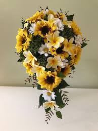 Plumeria (/pluːˈmɛriə/) is a genus of flowering plants in the family apocynaceae. Artificial Wedding Bouquet Teardrop Silk Wedding Bouquet Sunflowers Frangipani Ebay Sunflower Wedding Bouquet Hibiscus Wedding Wedding Flowers Sunflowers