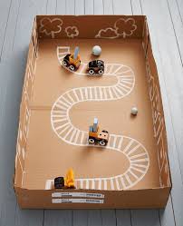 4 Brilliant Diy Toys Made Of Ikea Cardboard Boxes Petit Small Diy Toys Cardboard Box Crafts Diy Cardboard