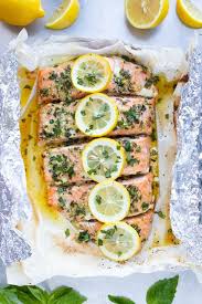 Basil Lemon Baked Salmon In Foil Easy Low Carb Evolving Table Recipe Healthy Salmon Recipes Salmon Recipes Oven Salmon Recipes