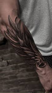 Angel wing tattoos 125 angel wing tattoos that are heavenly intended for measurements 800 x 1067 angel wings tattoo on arm the tattoos can be perceived as an indication of toughness, strength, and a small bit of softness. 150 Divine Angel Wings Tattoos Ideas Meanings Tattoo Me Now