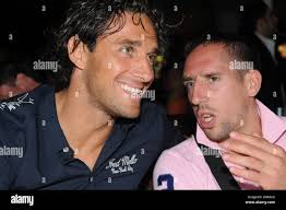 Soccer players Luca Toni (L) and Franck Ribery of German Bundesliga club FC  Bayern Munich attend the summer party of the restaurant Hugos in Munich,  Germany, 28 July 2009. Guests and celebrities