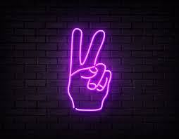 A glowing, purple peace sign over a purple sunrise background. Peace Sign Neon Led Sign Artivation