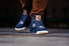 An On Feet Look At The Levi S X Air Jordan 4 Denim Kicksonfire Com Air Jordans Jordan 4 Jordans