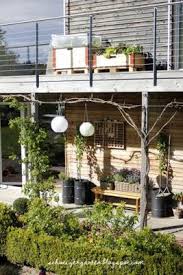 Aprilschnee Frostschaden Gartenbeete Veranda Holzhaus Larche Terrasse Solarleuchten Lampions Terrasse Sitzplatz Gartengestaltung Ums Haus