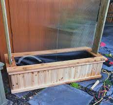 This guide will teach you how to build a retaining wall with concrete blocks. Diy Outdoor Water Wall Privacy Screen Interior Frugalista
