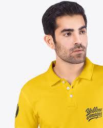 Download Man In A Polo T Shirt And Jeans Mockup In Apparel Mockups On Yellow Images Object Mockups