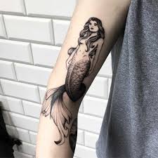 Awesome black ink mermaid tattoo design. Blackwork Mermaid Tattoo Tattoogrid Net