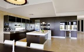 'i didn't want the design to be too modern, so i worked with tom bayley of quartet interiors to create an understated shaker style,' says flora soames, the interior designer of this custom made london kitchen. Modern Kitchen Design With Large Island Novocom Top