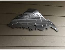 Mount the hanger of your choice to the wall. Smw0765 Mount Rainier Wall Art Metal Sunriver Metal Works