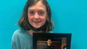 Brick girl helps the Asbury Park stray pit bull who became a K-9 cop