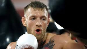 Floyd Mayweather v Conor McGregor: Lennox Lewis calls fight a 'farce'