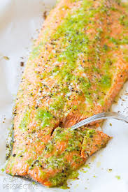 Must Try Spicy Garlic Lime Oven Baked Salmon Salmon Dinner Recipe Baked Salmon Salmon Dishes Seafood Recipes