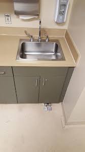 this sink in a hospital has foot pedals