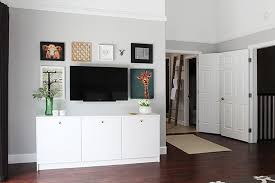 When choosing a wall color to go behind your tv, just as you would when painting otherwise, take into consideration colors that will work best with the nothing ruins the look of a nice television mounted on the wall quicker than a tangle of exposed wires. Hide The Cables Behind A Wall Mounted Tv
