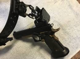 What 3 gun holsters are you running STI 2011