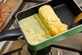 Tamagoyaki, literally meaning 'grilled/fried egg', is made by rolling together thin layers of seasoned egg in a frying pan. Tamagoyaki Japanese Rolled Omelette çŽ‰å­ç„¼ã Just One Cookbook