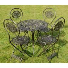 This Gorgeous Garden Set Contains Four Chairs And One Circle Table Finished In Black With Gold Garden Patio Furniture Garden Furniture Garden Furniture Sets
