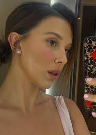 Millie Bobby Brown Debuts a Fresh Hair Look in a Sparkly Pink Push-Up Bra