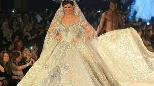 يسرا اللوزي بفستان هاني البحيري. ÙŠØ³Ø±Ø§ Ø§Ù„Ù„ÙˆØ²ÙŠ Ø¨ÙØ³ØªØ§Ù† Ø²ÙØ§Ù Ù…Ø±Øµ Ø¹ Ø¨Ø§Ù„Ø£Ù„Ù…Ø§Ø³ Ù…Ù† ØªÙˆÙ‚ÙŠØ¹ Ø§Ù„Ø¹Ø§Ù„Ù…ÙŠ Ù‡Ø§Ù†ÙŠ Ø§Ù„Ø¨Ø­ÙŠØ±ÙŠ Ø§Ù„Ø¨ÙˆØ§Ø¨Ø©