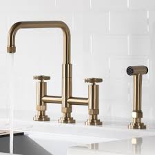 Choose from our from wide selection of kitchen taps and sprayers, designed to match any sink style and fit any space. Kraus Urbix Transitional 2 Handle Bridge Kitchen Faucet With Side Sprayer In Brushed Gold Kpf 3125bg The Home Depot