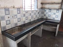 The distance from the countertop to the bottom of the upper cabinets or shelves should be 15 to 20 inches. Kitchen Otta Designs India