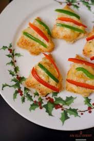 This fresh appetizer is is a great choice for vegetarian guests. Easy Cheesy Christmas Tree Shaped Appetizers An Alli Event