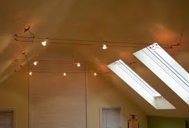 I want fluorescent lighting because i can get high kelvin with wider coverage to paint myself, i don't think i would like the fixtures mounted to the sloped walls. Lighting Scorpio Interiors