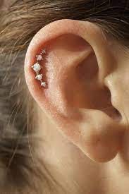 25 Types Of Ear Piercings And Cute Designs Ear Piercing For Women Opal Studs Earings Piercings