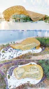 The Butterfly Pavilion Features A Golden Roof Made Up Of 4 000 Aluminum Leaves Architecture Contem Pavilion Architecture Butterfly Pavilion Pavilion Design