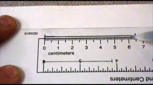 How to read centimeter ruler. Measuring To The Nearest Cm And Mm Youtube
