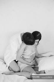 Romantic cuddling with my boyfriend подробнее. Man Cuddling And Kissing Woman Bedroom Scene Intimate Stock Photo 156600278