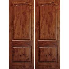 Browse pictures of interior and exterior pivot doors for inspiration to add to your own home or building. Krosswood Knotty Alder 1 3 8 2 Panel Top Rail Arch Double Doors